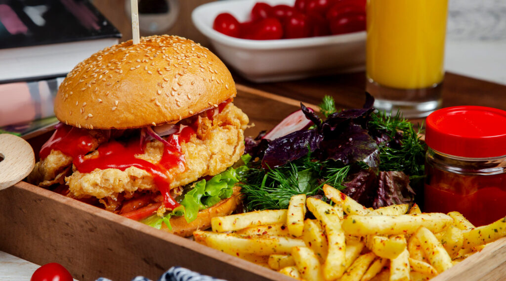 burger with herbs and spicy french fries